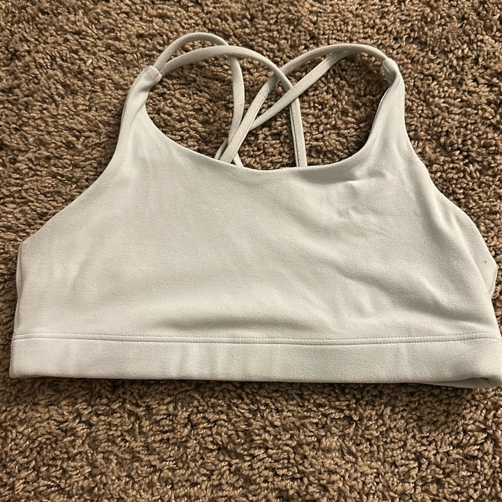 Athlete sports bra, size child large(12), color- light blue